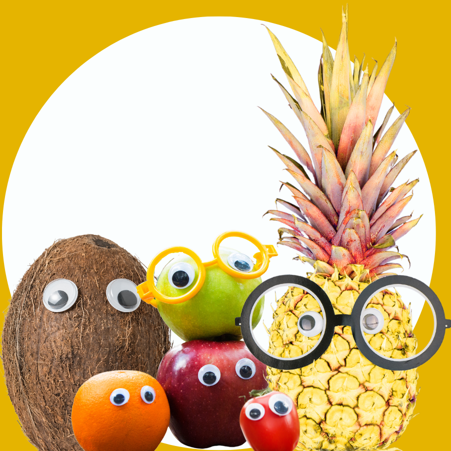 A mix of whole tropical fruit with googly eyes, some wearing glasses
